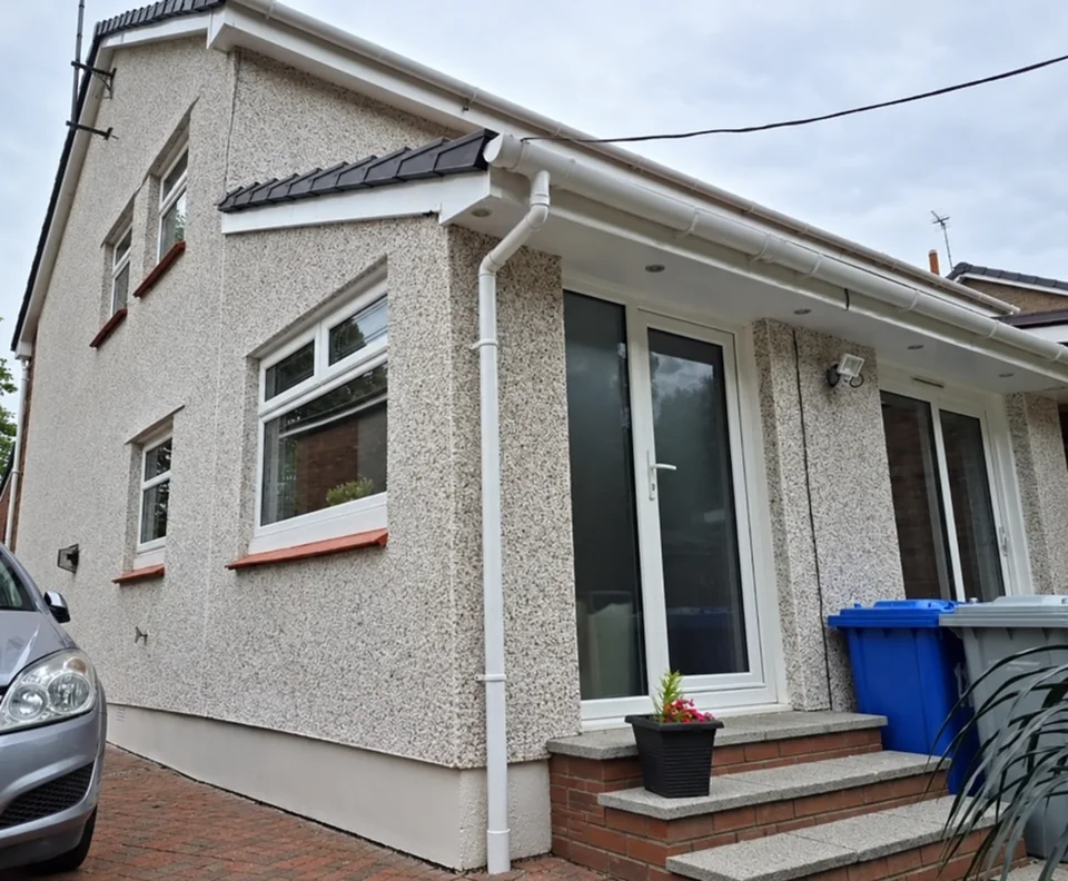 Textured roughcast on a house facade